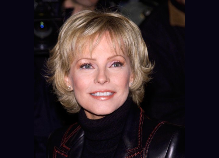 Cheryl Ladd with short hair and wearing a turtleneck